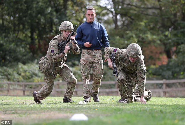 Soldiers take part in a demonstration of the Fire and Movement stage of the new test