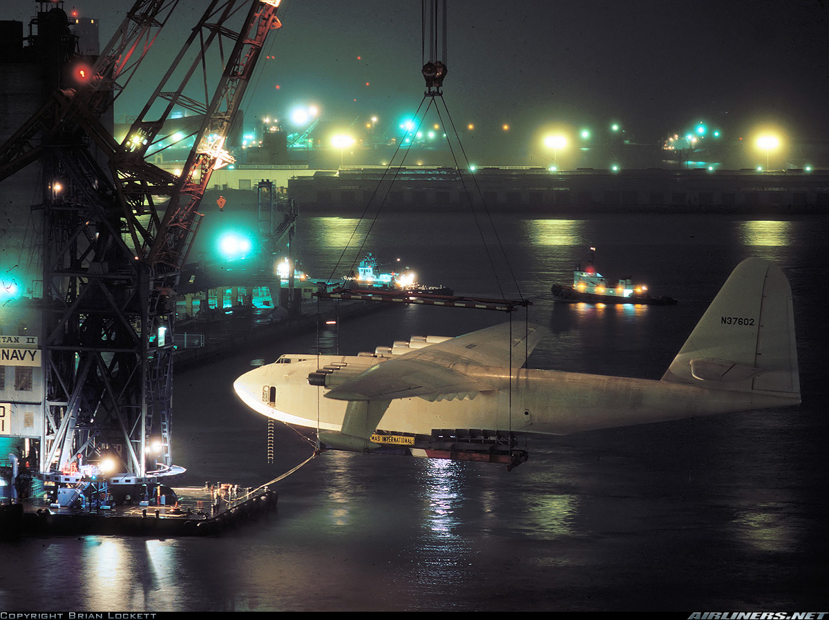 The Spruce Goose is slowly backed into the dome next to the Queen Mary.<br /><br />Port of Long Beach