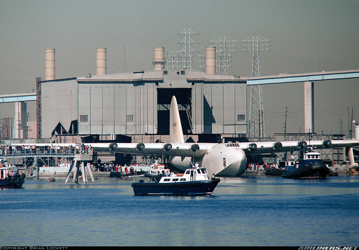 The Spruce Goose is slowly backed into the dome next to the Queen Mary.<br /><br />Port of Long Beach