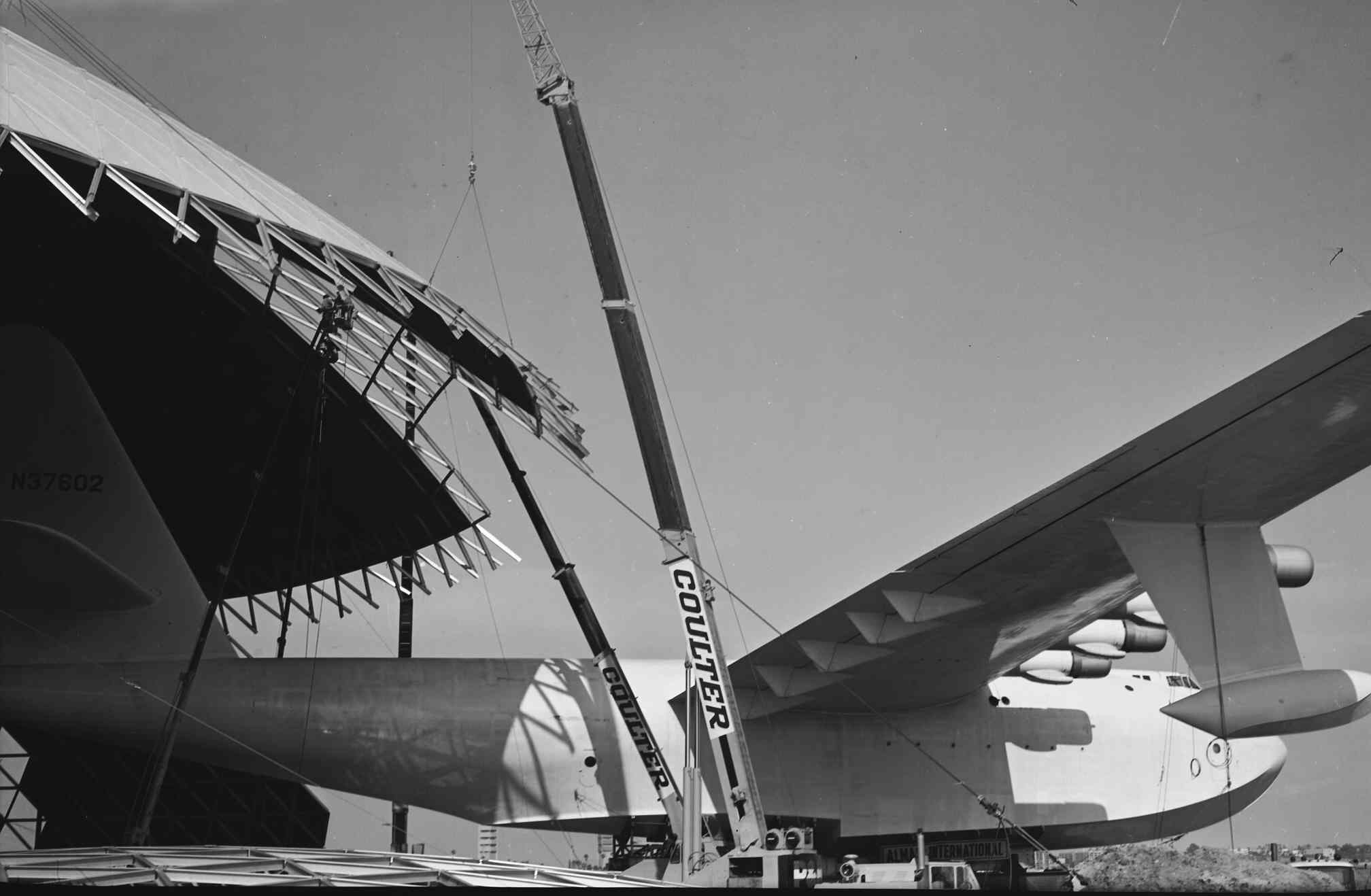 The Spruce Goose is slowly backed into the dome next to the Queen Mary.<br /><br />Port of Long Beach