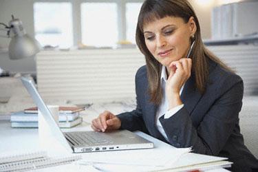 Businesswoman working at desk